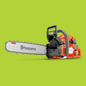Professional arborist performing safe tree felling on residential property