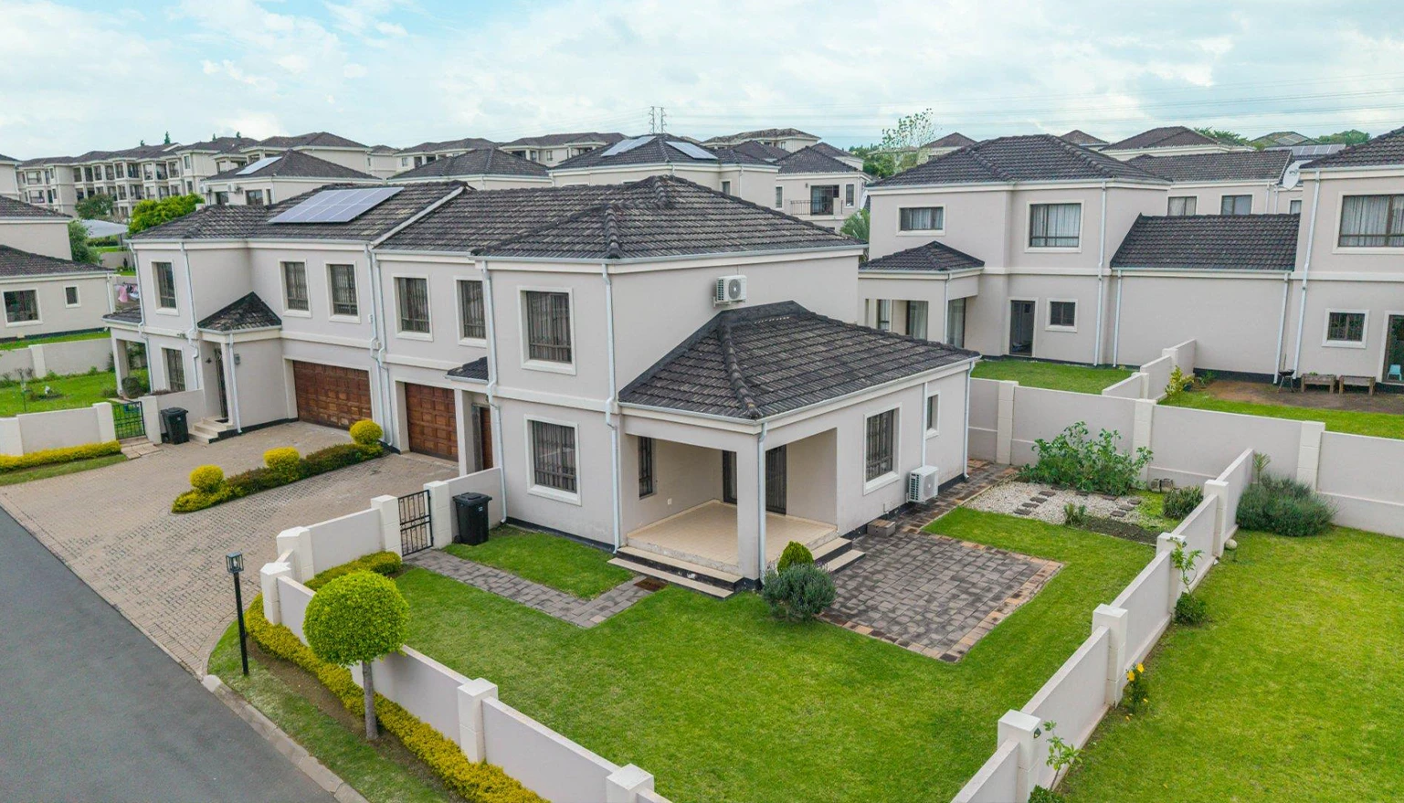 Premium landscaping and garden design project in Midrand featuring luxury garden design, lush lawns, irrigation systems, and outdoor living spaces by Lushline Gardens.