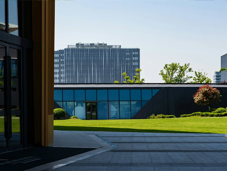 Professional commercial landscaping for modern office development with landscaped gardens, lawn areas, pathways, and corporate outdoor spaces by Lushline Gardens.
